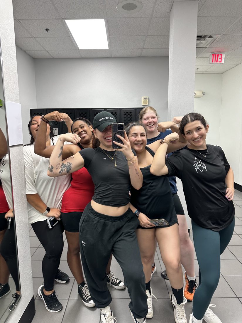 TWP members taking a group selfie together after a workout