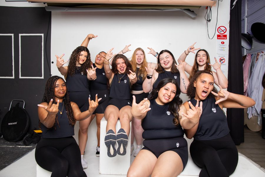 The content crew posing together in the studio